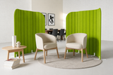 Freestanding curved acoustic office partition screen in workspace green colour
